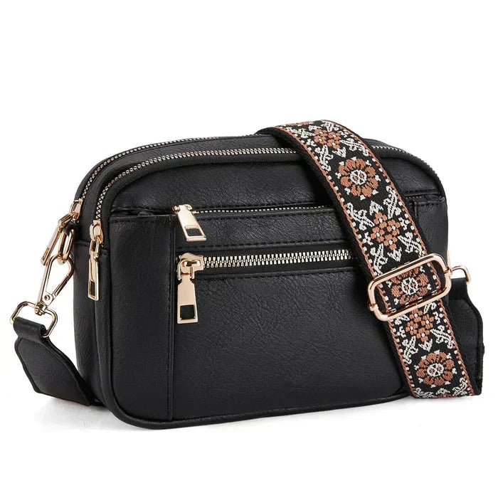 Arvida | Crossbody-veske med trykt stropp