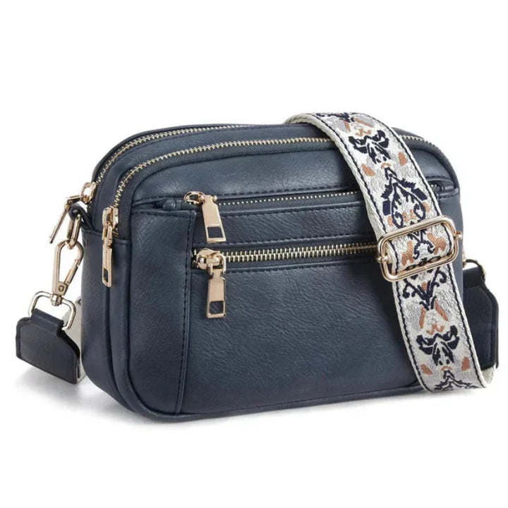 Arvida | Crossbody-veske med trykt stropp